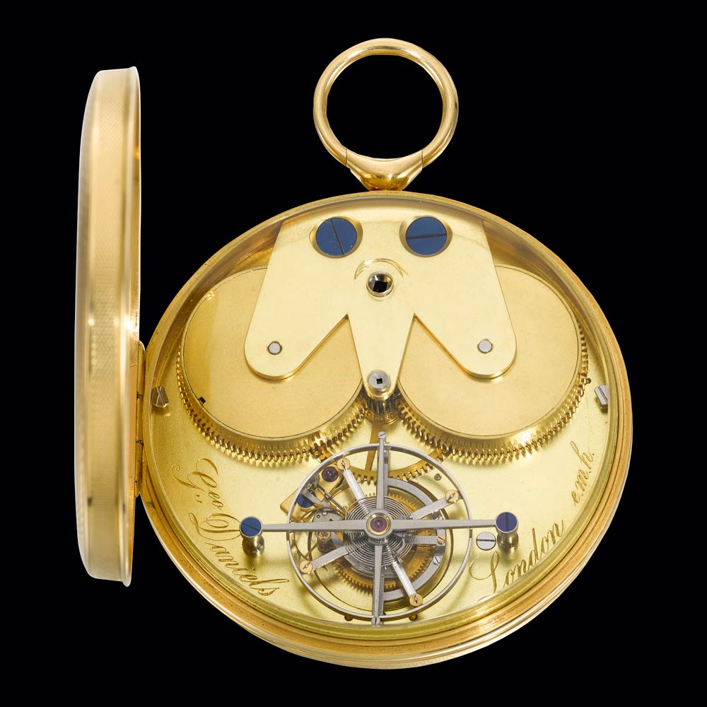 Lot 78: George Daniels, London AN IMPORTANT GOLD TWIN BARREL ONE MINUTE TOURBILLON WATCH WITH SPRING DETENT CHRONOMETER ESCAPEMENT AND RETROGRADE HOUR HAND MADE FOR EDWARD HORNBY 1970, NO. E.M.H.