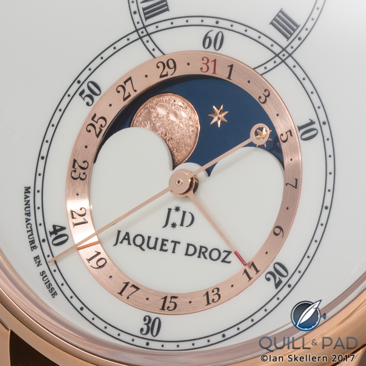 Close up look at the details in the engraved moon of the Jaquet Droz Grande Seconde Moon Ivory Enamel