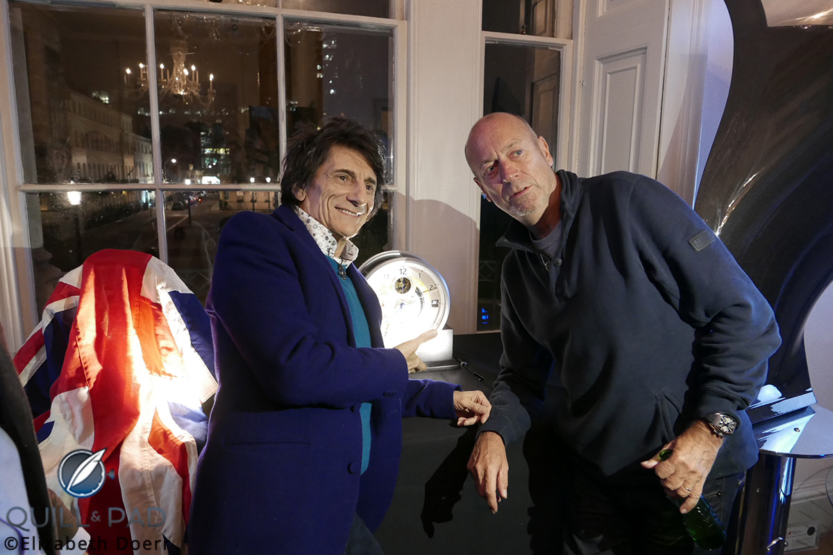 Ronnie Wood and the collector who purchased the first Bremont B1 Marine Clock pose with it during the brand’s Townhouse event