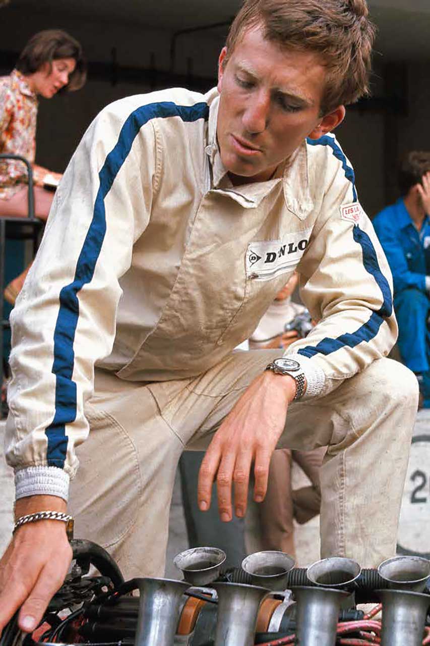 Jochen Rindt beside the Maserati V12 engine of his Cooper car, Italy, Monza, 10 September 1967. (Photo by Rainer W. Schlegelmilch/Getty Images)
